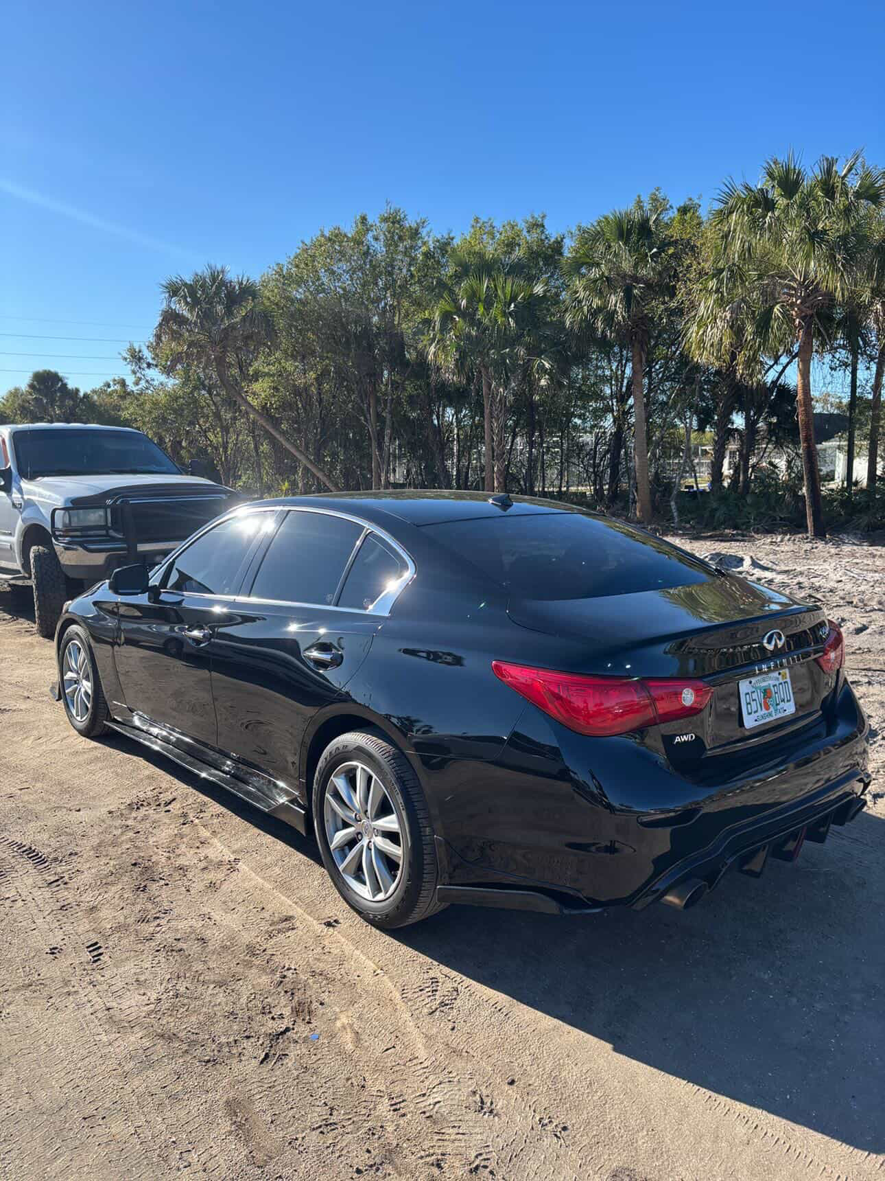 Black Infiniti glossy exterior detail
